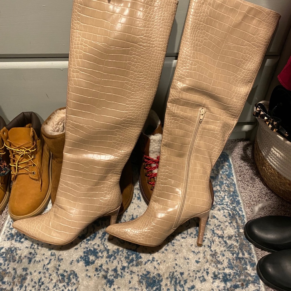 Knee-high high heel alligator skin boots